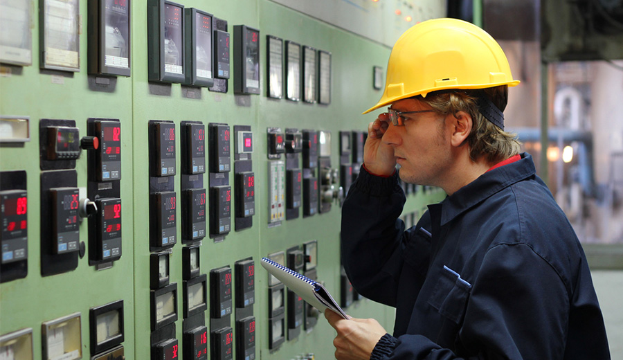 Worker in a Control Room. Photo: Shutterstock